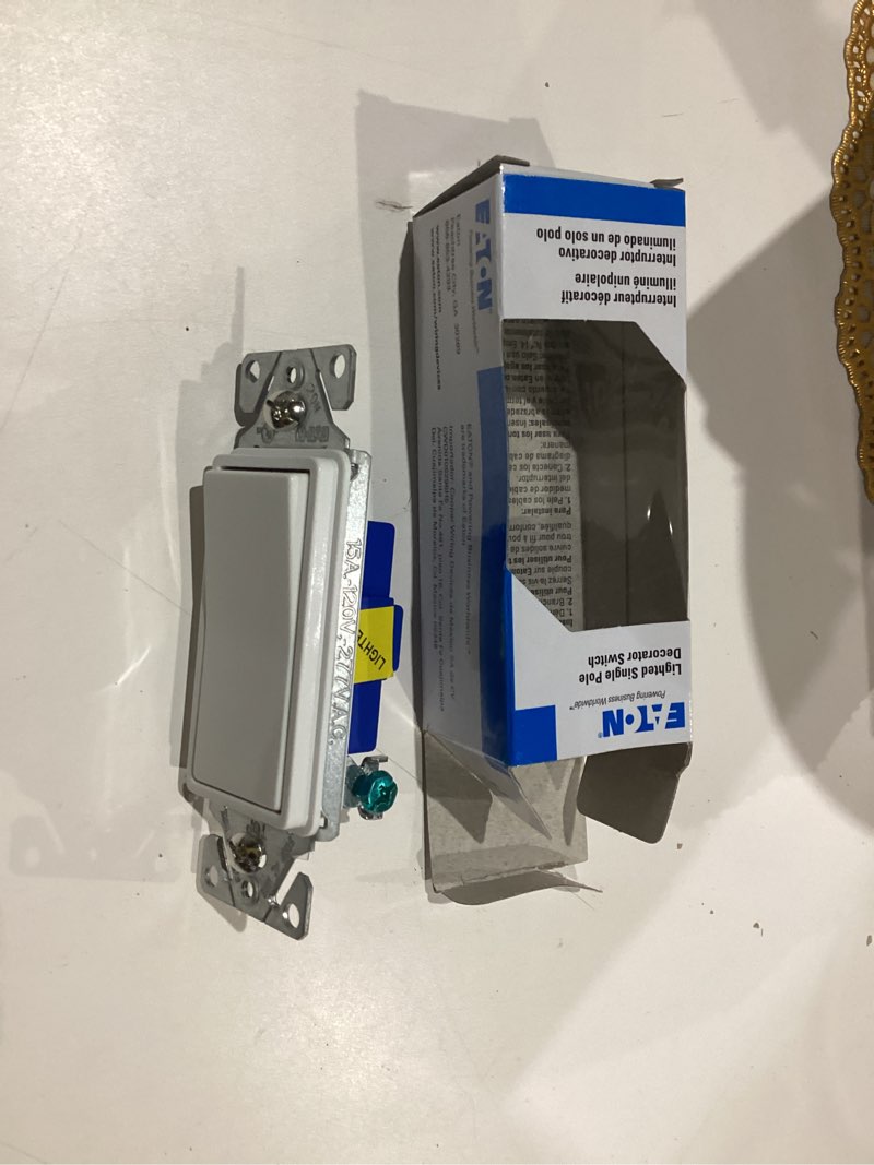 Condition photo showing As Is for eaton 15-amp single-pole illuminated rocker light switch, white