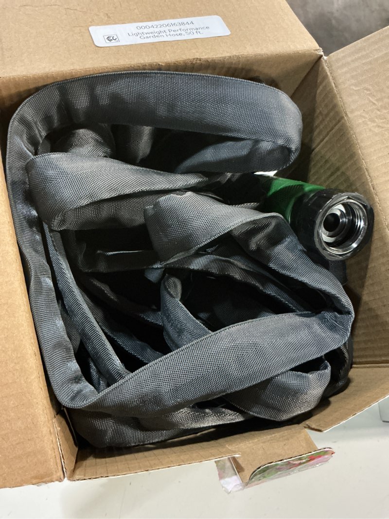 Condition photo showing As Is for expert gardener lightweight performance 50 ft garden hose