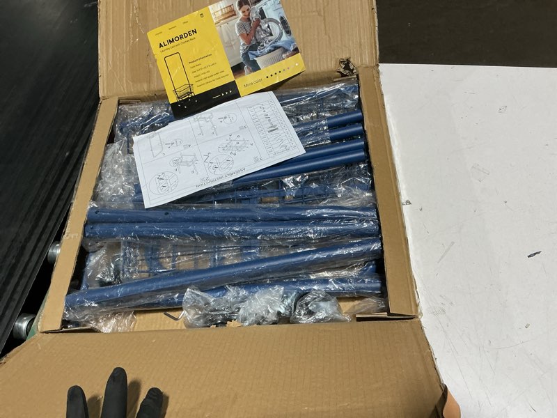 Condition photo showing As Is for ALIMORDEN Laundry Cart with Clothes Rack, Rolling Laundry Butler with Wire Storage Rack?Navy Blue