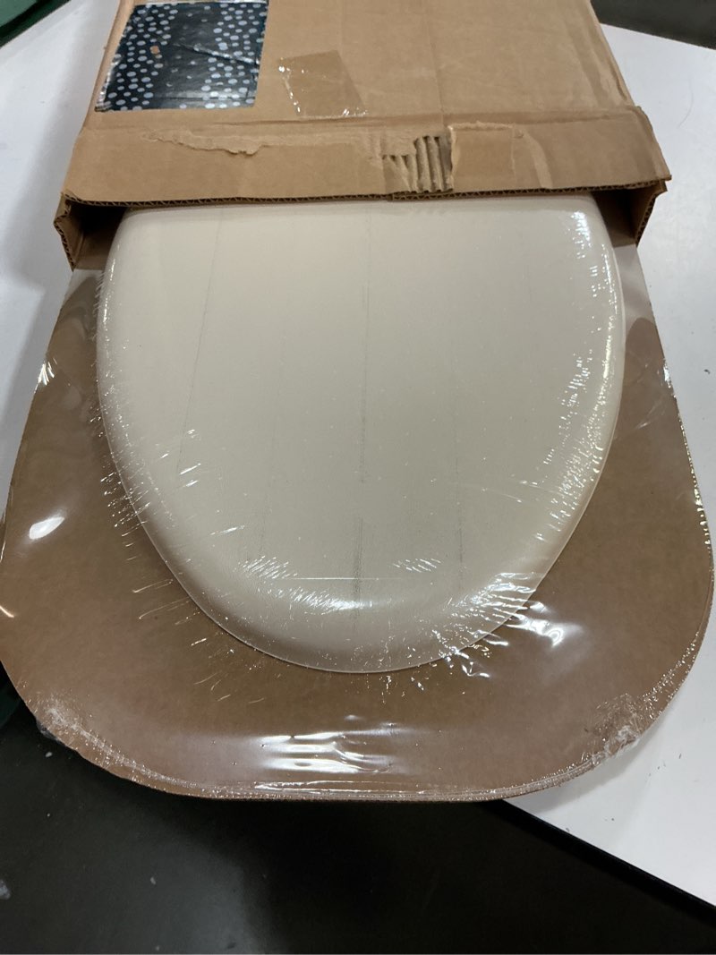 Condition photo showing New/Like New for mayfair padded toilet seat, cushioned soft vinyl over wood core seat, secure hinges, easy clean, made in usa, elongated, bone