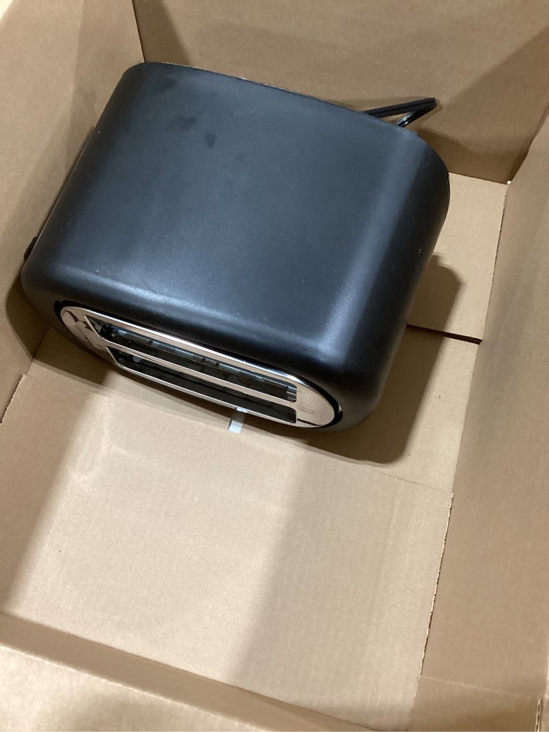 Condition photo showing As Is for Amazon Basics 2 Slice Toaster, With 6 Browning Settings, Extra Wide Slots For Bagels and Special Breads, Removable Easy-to-Clean Crumb Tray, Cancel/Defrost/Bagel Buttons, 900W, Black & Silver 2 Slice Silver Front