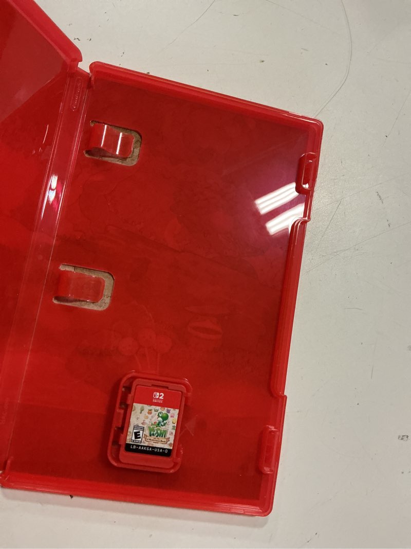 Condition photo showing New/Like New for yoshi and the mysterious book - nintendo switch 2