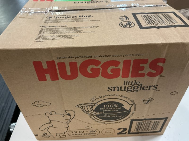 Condition photo showing New/Like New for huggies size 2 diapers, little snugglers baby diapers, size 2 (12-18 lbs), 186 count (3 packs of 62), packaging may vary