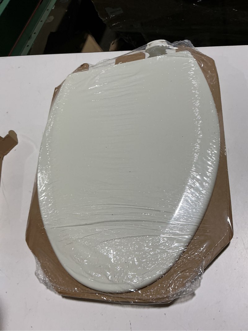 Condition photo showing New/Like New for bemis elongated enameled wood toilet seat in biscuit with easy•clean? hinge