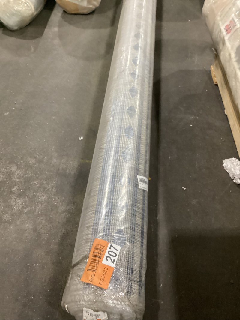 area rug 9’3”x12’6” (product info unknown)