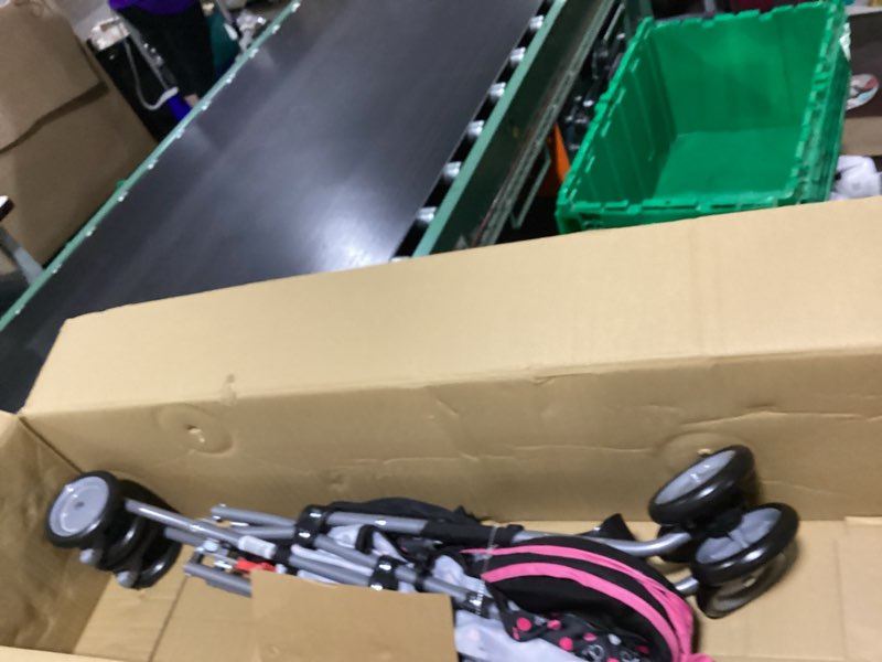 Condition photo showing New/Like New for disney baby comfort height character umbrella stroller with basket, modern minnie, toddler, unisex