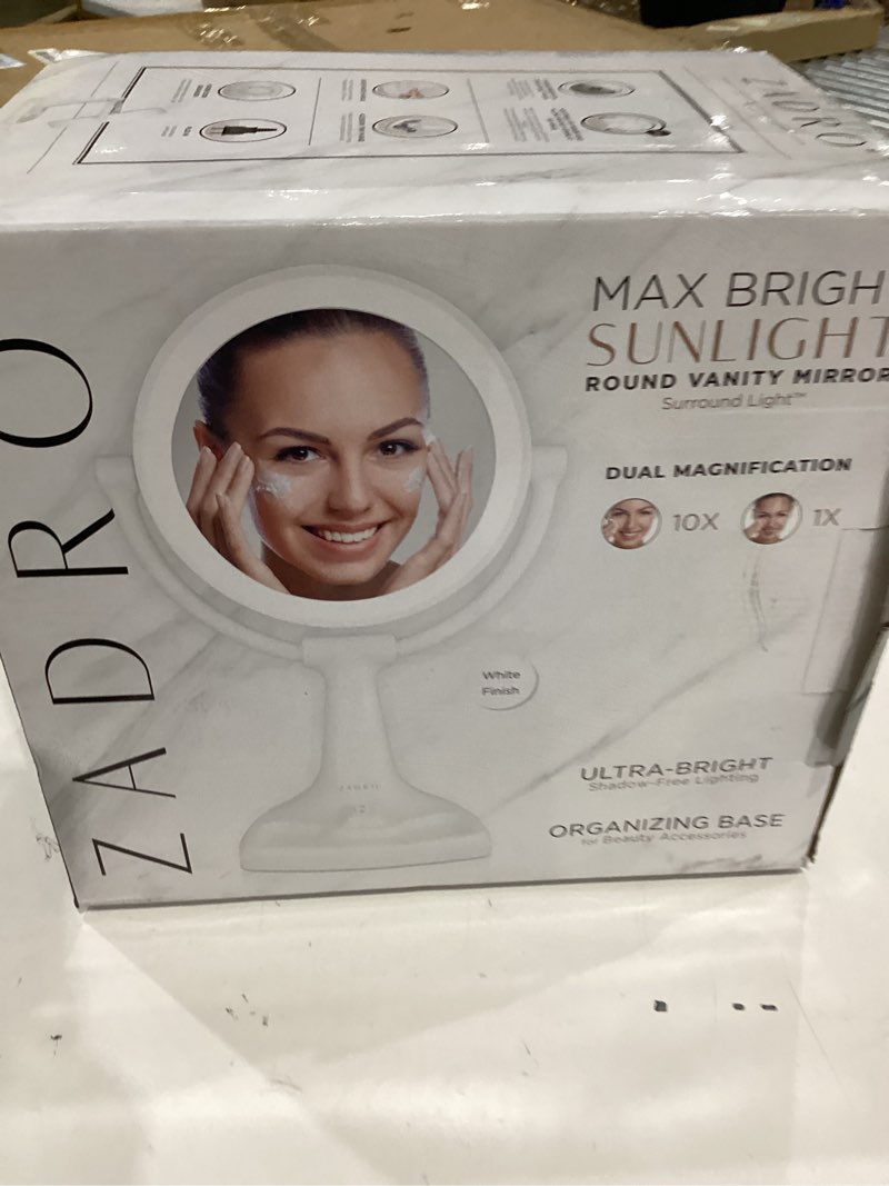 Condition photo showing As Is for zadro 11" fluorescent lighted makeup mirror with 10x/1x magnification and tray