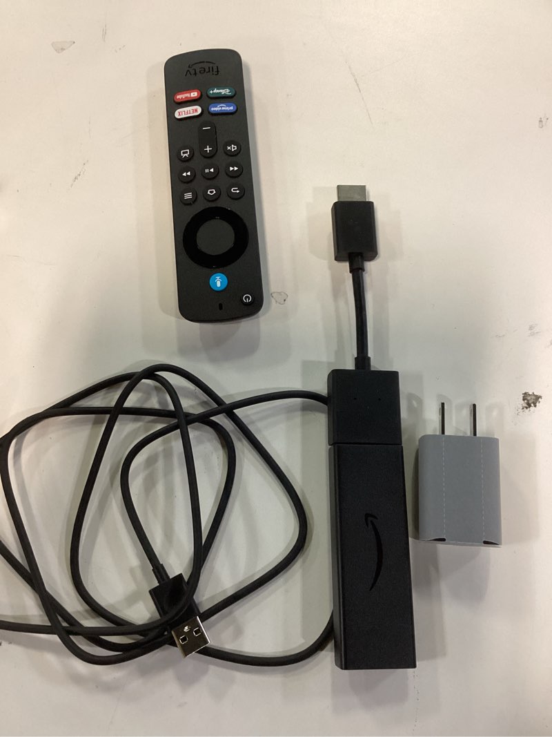 Condition photo showing As Is for Amazon Fire TV Stick HD (newest model), free and live TV, Alexa Voice Remote, smart home controls, HD streaming