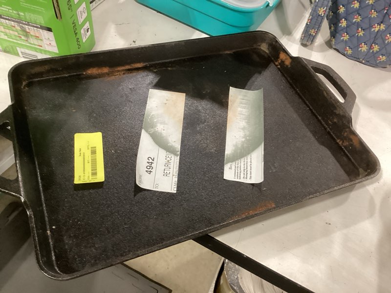Condition photo showing As Is for square cast iron skillet