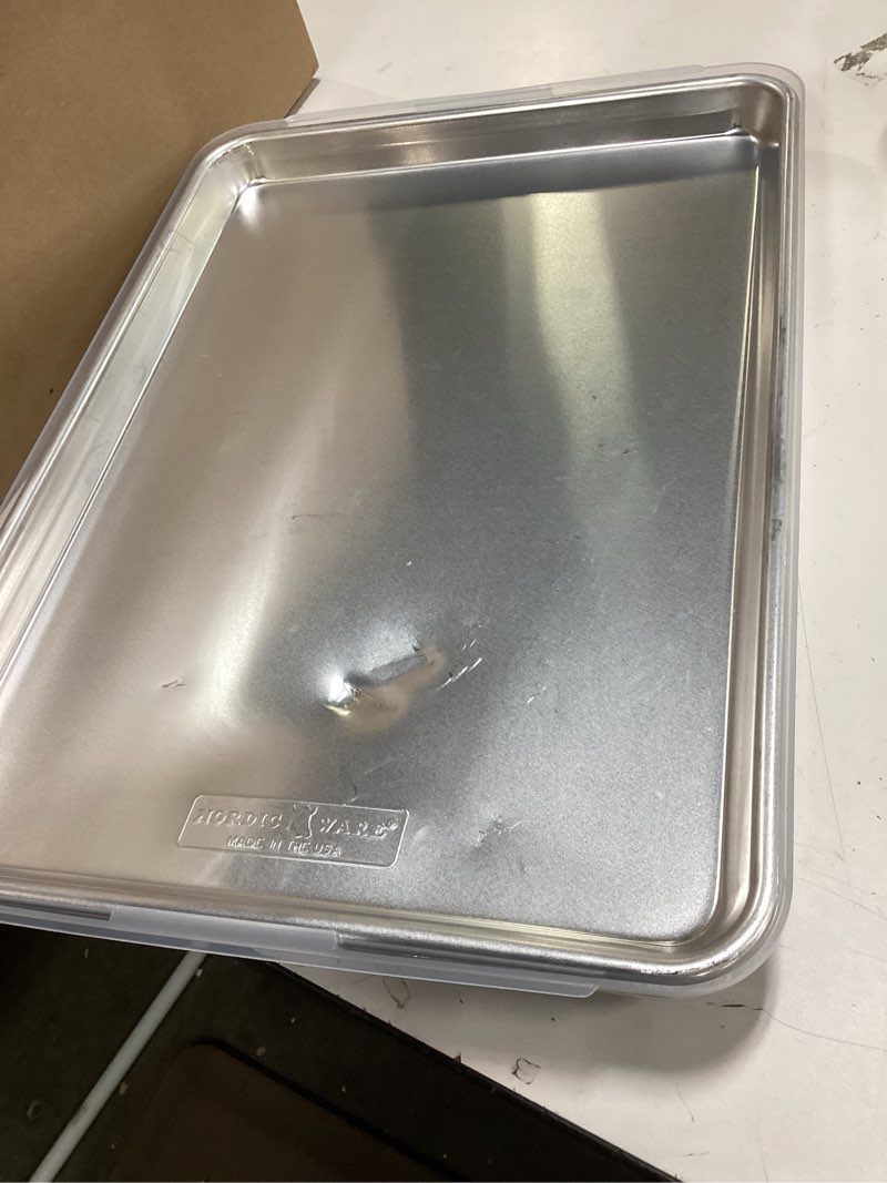Condition photo showing As Is for Nordic Ware Naturals Half Sheet Set - USA Made Aluminum Commercial Quality Sheet Pan for Baking or Roasting, Encapsulated Galvanized Steel Rim Prevents Warping, 2pk Half + Lid
