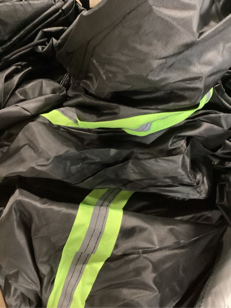 Black tent cover damaged