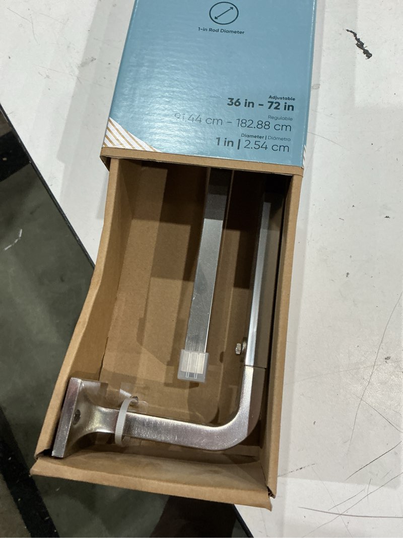 Condition photo showing Good Condition for origin 21 36-in to 72-in brushed nickel iron corner curtain rod with finials