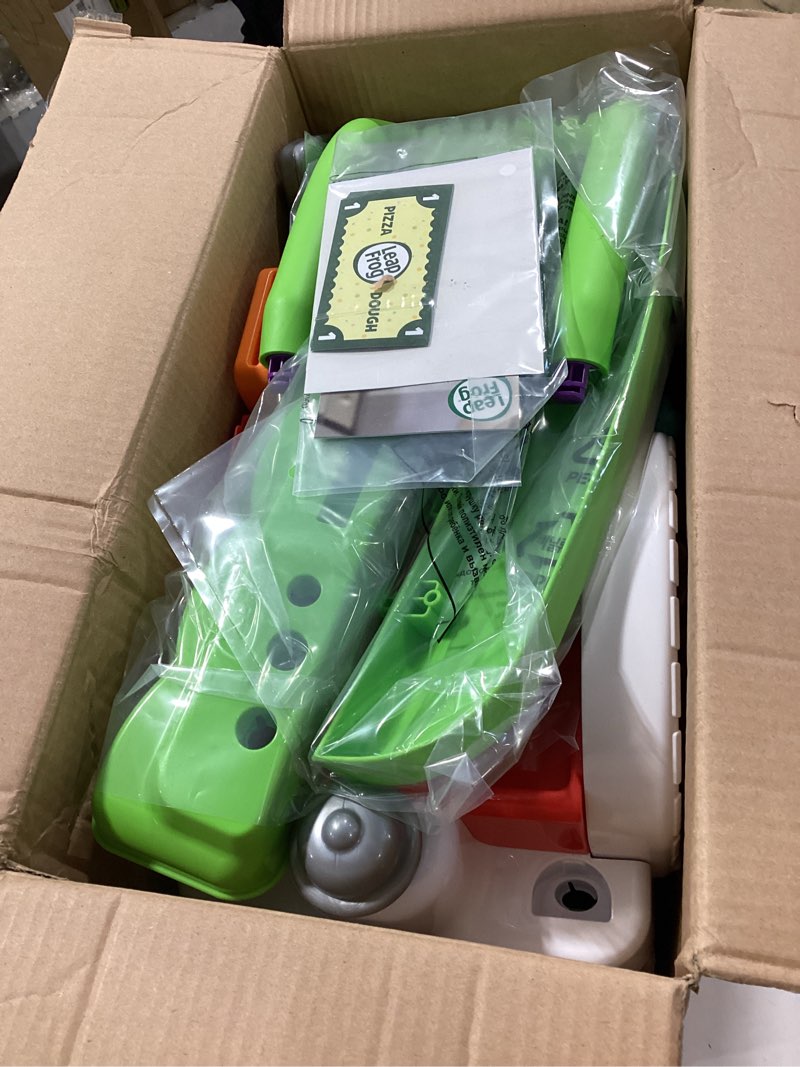 Condition photo showing As Is for LeapFrog Build-a-Slice Pizza Cart (Frustration Free Packaging) Standard Packing Multicolor