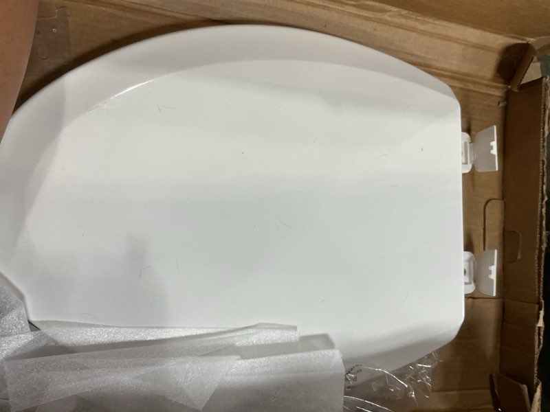Condition photo showing As Is for centoco elongated toilet seat, heavy-duty wood core with plastic scratch-resistant finish, made in the usa, 900-001, white white standard elongated
