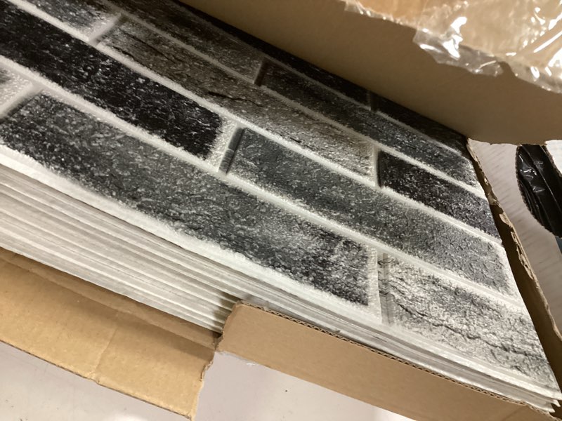 Condition photo showing Good Condition for Art3d 10-Pack 52.5 Sq.Ft Faux Brick 3D Wall Panels Peel and Stick in Stone Ash, Self Adhesive Waterproof Foam Wallpaper for Bedroom, Bathroom, Kitchen 10 Stone ash