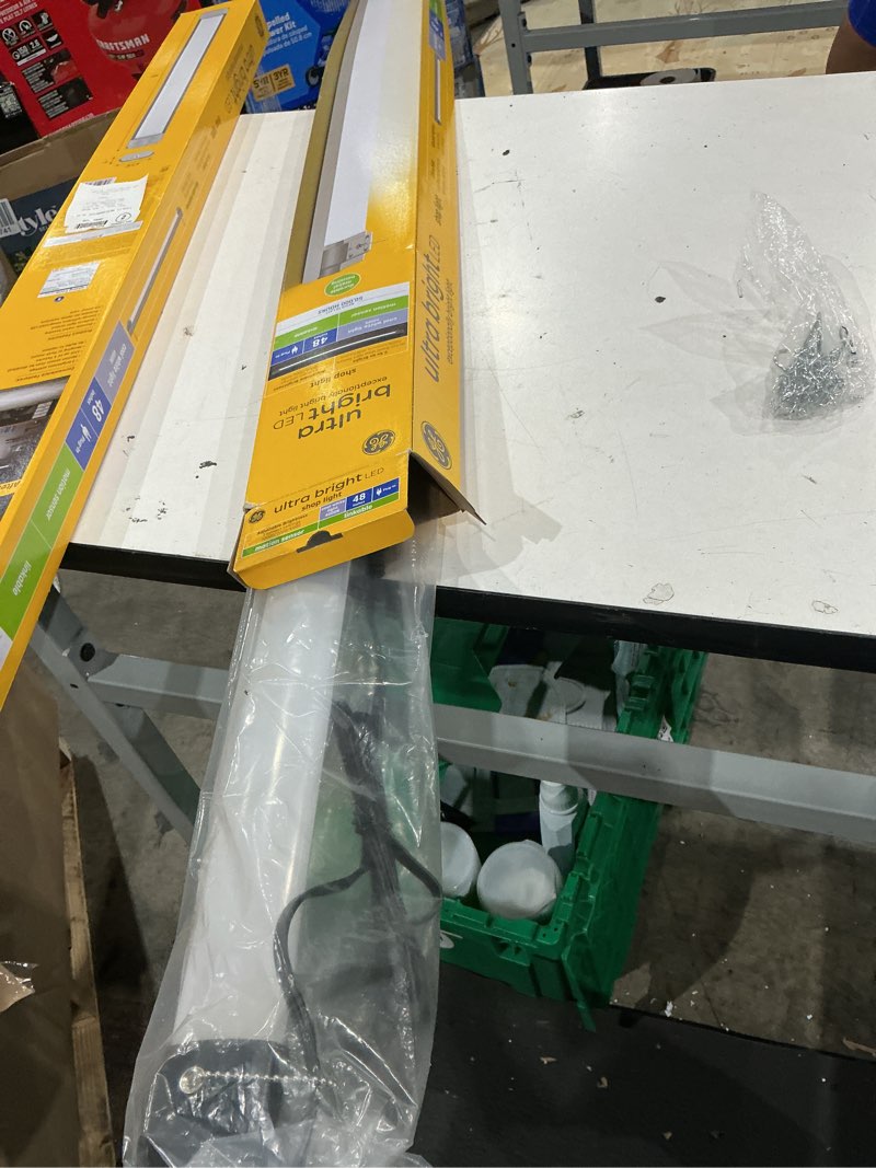 Condition photo showing As Is for ge 4-ft 10000 lumens white cool white led linear garage shop light