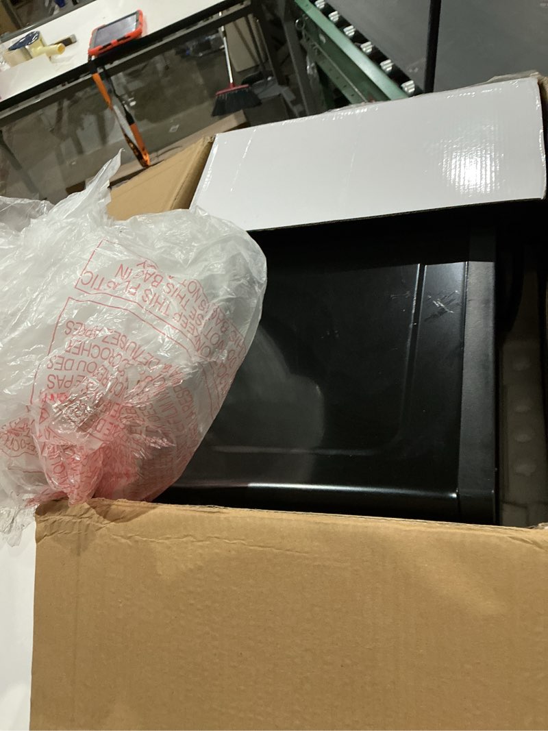 Condition photo showing As Is for frigidaire countertop microwave - digital control panel - 6 auto cooking settings - 10 power levels - child safety lock - 0.7 cu. ft., stainless steel silver