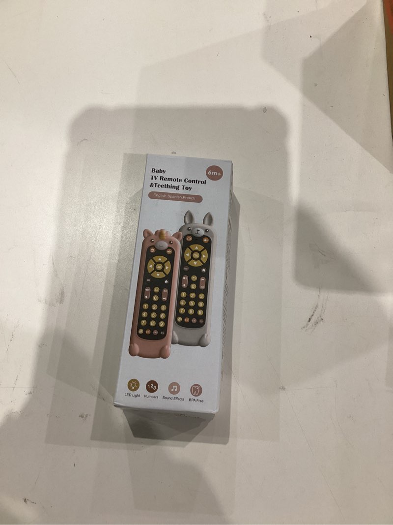 Condition photo showing New/Like New for Nueplay Baby TV Remote Control Toy with Silicone Teether Cover, Toddler Realistic Controller, Early Number Learning in 3 Languages (English, Spanish & French), Preschool Girls Toys 6, 12, 18 Months Silicone Cover+black Remote