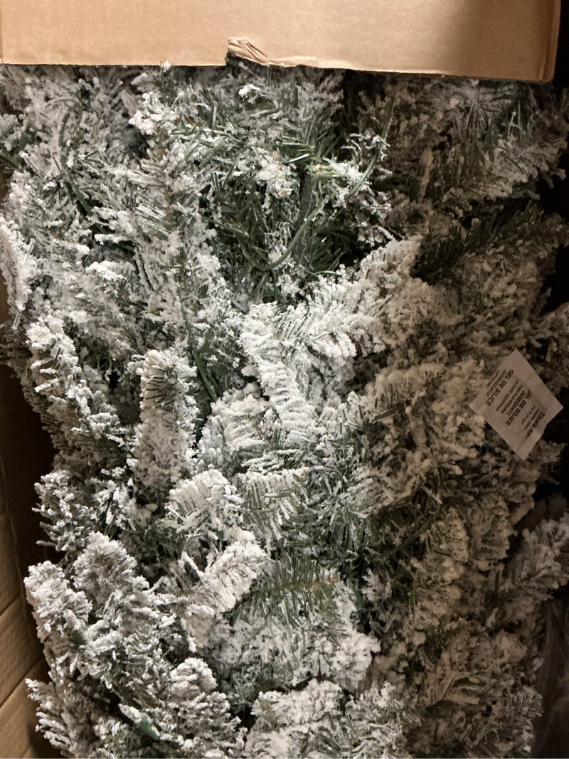 Condition photo showing Good Condition for Puleo International 7.5 Foot Pre-Lit Slim Flocked Fraser Fir Artificial Christmas Tree with 500 UL Listed Clear Lights 7.5' Slim Flocked Fraser Fir with 500 Clear Lights Christmas Tree