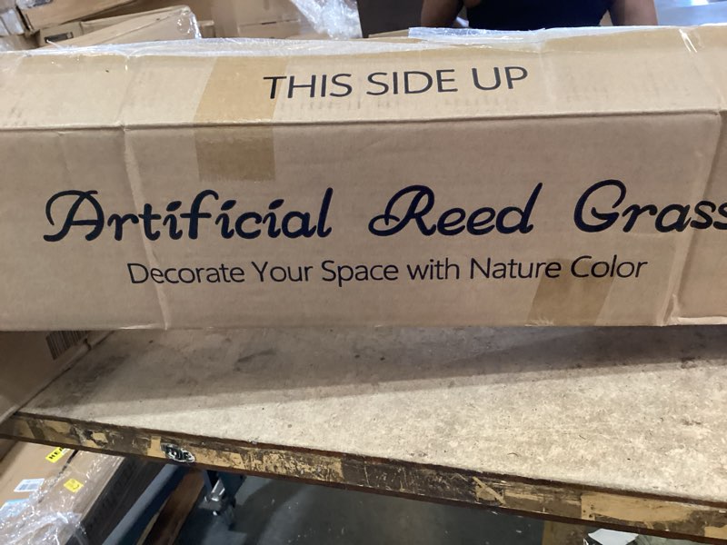 Condition photo showing Good Condition for artificial reed grass 