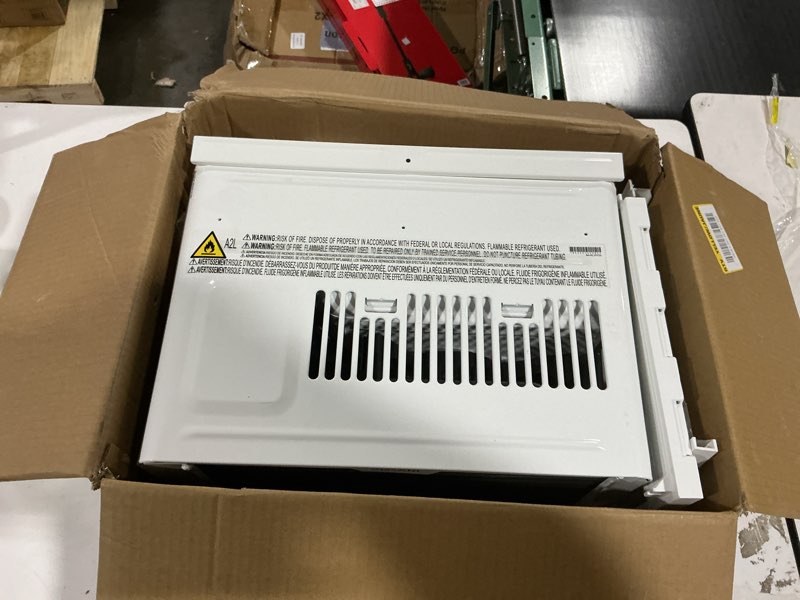 Condition photo showing Good Condition for 6,000 btu 115-volt window air conditioner for 250 sq. ft. rooms with remote in white