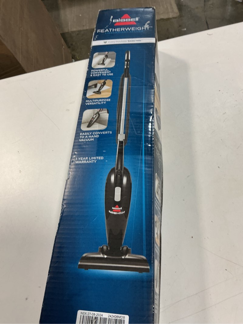 Condition photo showing New/Like New for bissell featherweight stick lightweight bagless vacuum with crevice tool, 2033m, black featherweight (black)