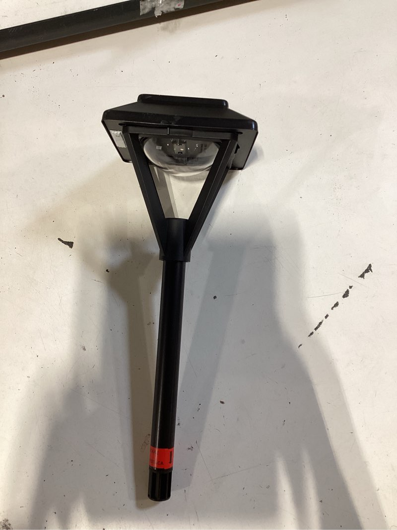 Condition photo showing As Is for harbor breeze pyramid path 20 -lumens black solar led outdoor path light ( 3300-k )