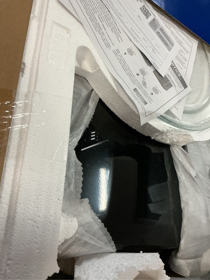 Condition photo showing As Is for ge gcst14s1wbb 1.4 cu. ft. black countertop microwave 1.4 cu.ft. black