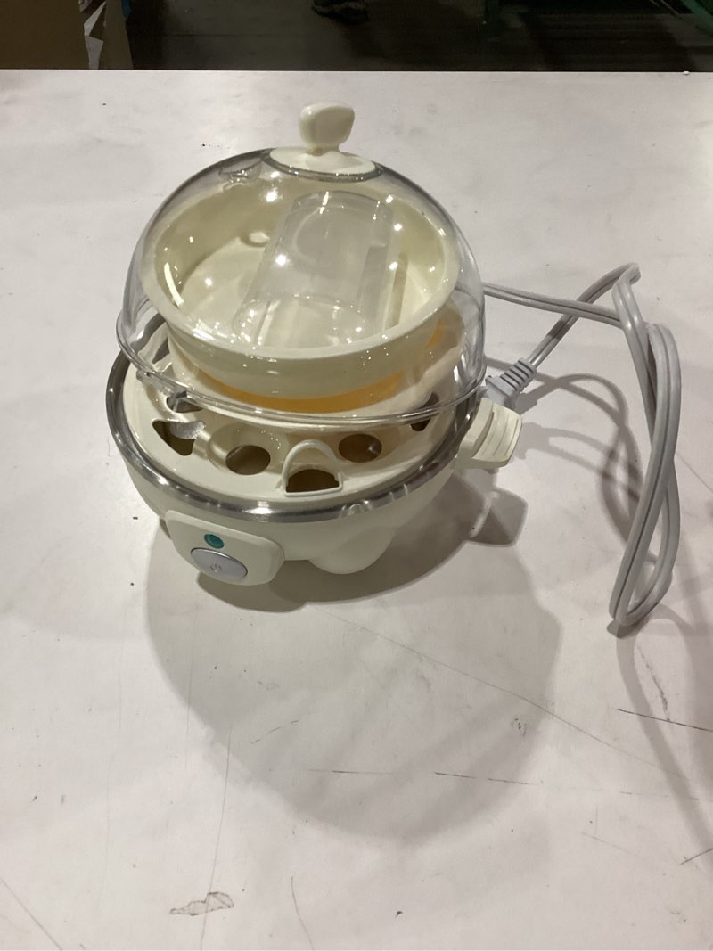 Condition photo showing As Is for Broken clip Dash Rapid Egg Cooker - Boiler, Poacher & Steamer - Includes Measuring & Recipe Guide - Dishwasher Safe - Holds 7 Eggs, Cream 7 Eggs Cream