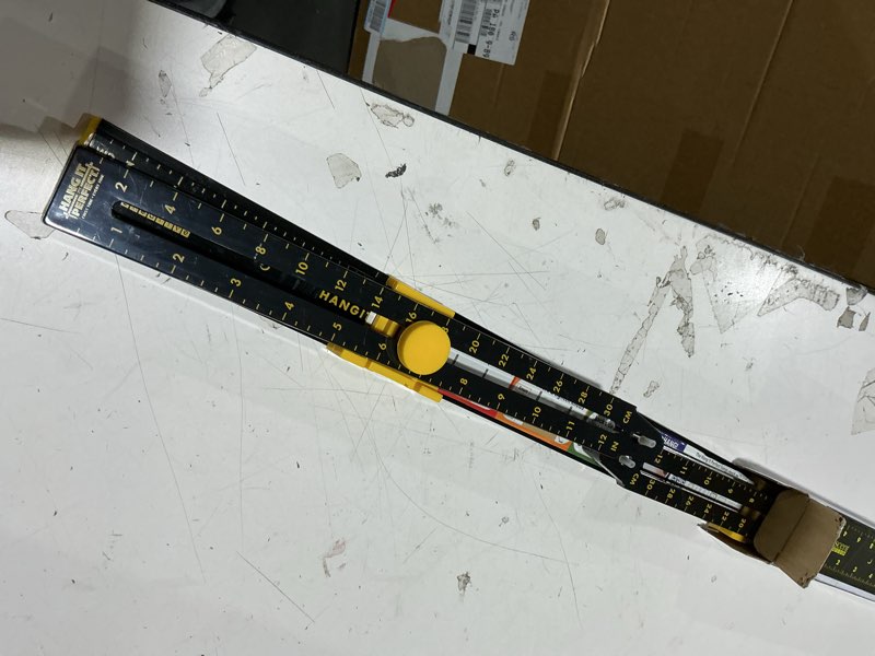Condition photo showing Good Condition for 24'' picture hanging tool