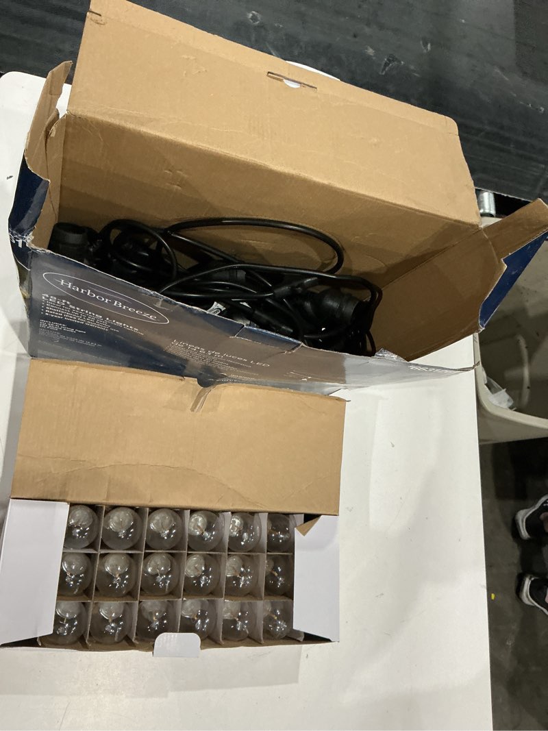 Condition photo showing As Is for harbor breeze 48-ft plug-in black indoor/outdoor string light with 24 white -light led edison bulbs