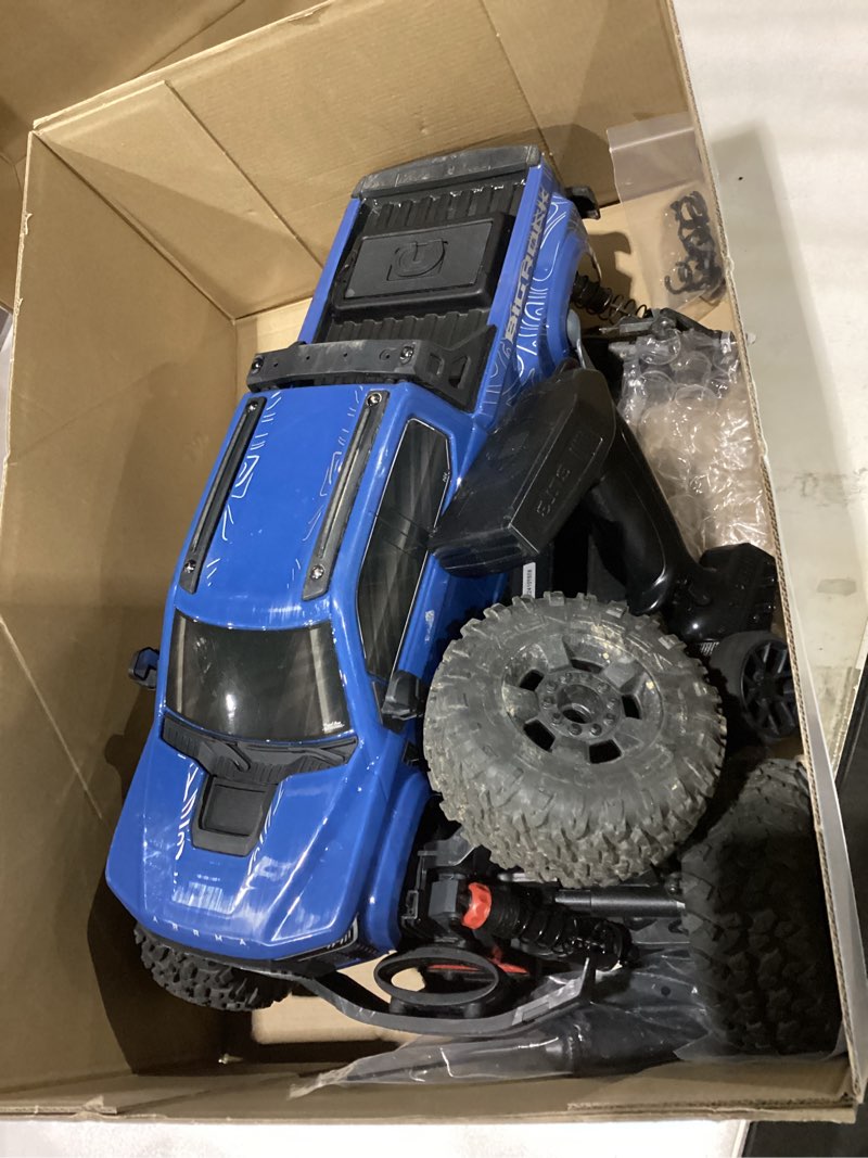 Condition photo showing As Is for ARRMA RC Truck 1/10 Big Rock 4X4 223S BLX BRUSHLESS Street Truck RTR (Batteries and Charger Not Included) with DSC, (Blue), ARA4312V4T3
