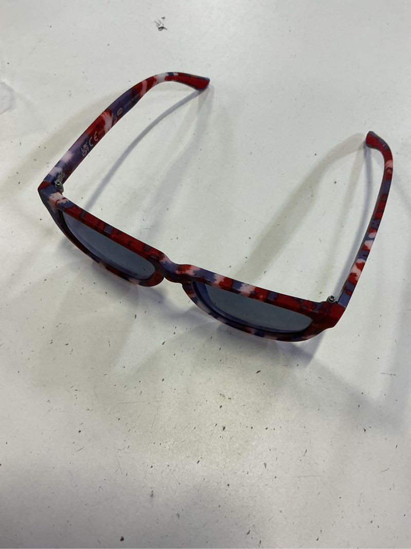 Condition photo showing New/Like New for youth square sunglasses tie dye