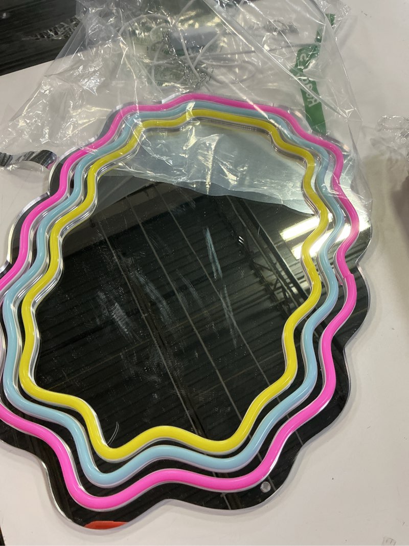 Condition photo showing As Is for Kavaas Wavy Neon Mirror 16.9" x 12.7", LED Wave Mirror with Lights for Bedroom, Girls Room - Best Gifts for Teen Girls, Birthday, Christmas Wavy Neon Mirror_M-WV1