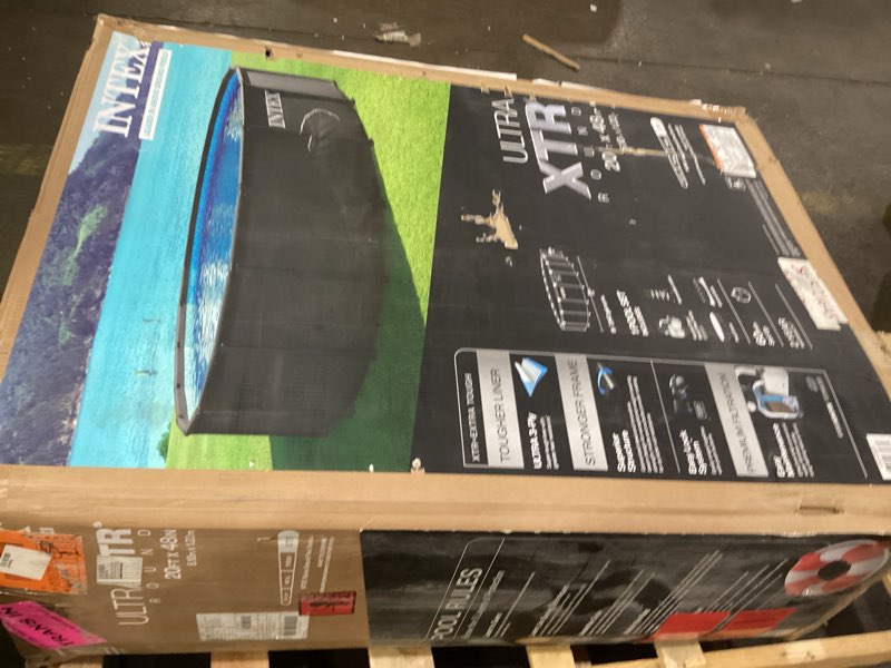 Condition photo showing As Is for intex 26333ep 20ft x 48in ultra xtr frame deluxe above ground swimming pool set with 2100 gph sand filter pump, removable ladder, ground cloth, pool cover, supertough, puncture and rust resistant updated packaging 20' x 48"