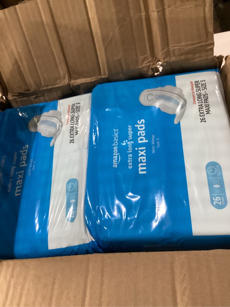 Condition photo showing New/Like New for Amazon Basics Thick Maxi Pads with Flexi-Wings for Periods, Extra Long Length, Super Absorbency, Unscented, Size 3, 104 Count (4 Packs of 26) Size 3 104