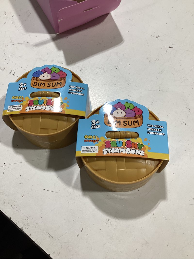 Condition photo showing Good Condition for dumpling squishy, 2pcs glitter dumpling squishy toys, squishies dumplings with mystery steamer box, stress & anxiety relief toys for kids & adults non-edible (glitter white gold)