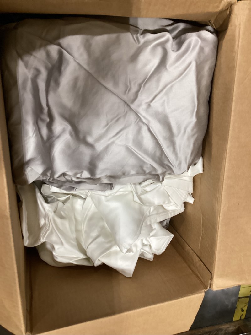 Condition photo showing As Is for mixed pillow case and bed sheets