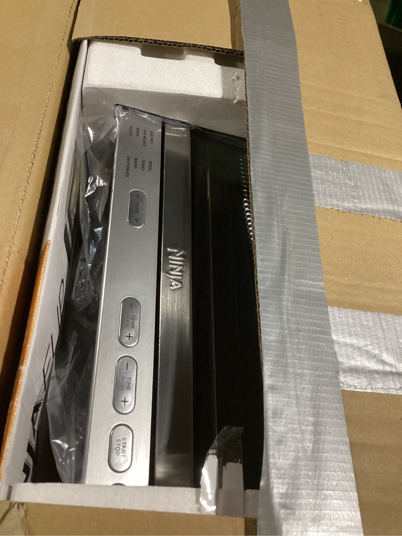 Condition photo showing Good Condition for Ninja Digital Air Fry Countertop Oven, 8-in-1 Functionality, 1800W, Flip-Up Design, XL Capacity, Air Fry Basket, Wire Rack & Crumb Tray, Silver, SP101 8-in-1 Flip Oven