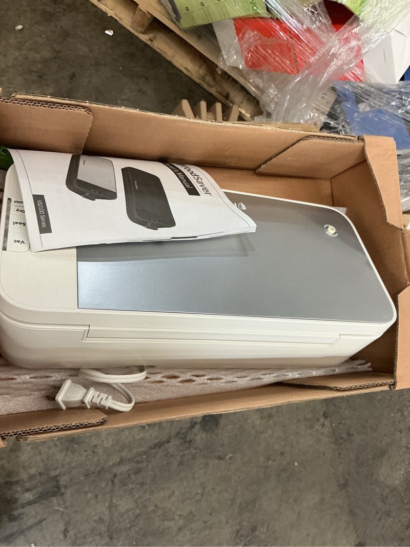 Condition photo showing As Is for FoodSaver VS2150 Vacuum Sealing System, Food Vacuum Sealer, White/Silver White/Silver Vacuum Sealer