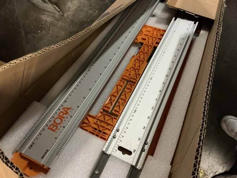 Condition photo showing As Is for BORA NGX 5pc Deluxe Clamp Edge Set - 50 inch Guide Rail + 50 inch Rail Extension, NGX Saw Plate, T-Square Attachment & Track Clamps - Track Saw system for Circular Saw - 544550 5Pc NGX Set with Saw Plate RT & T-Square Attachment 544550