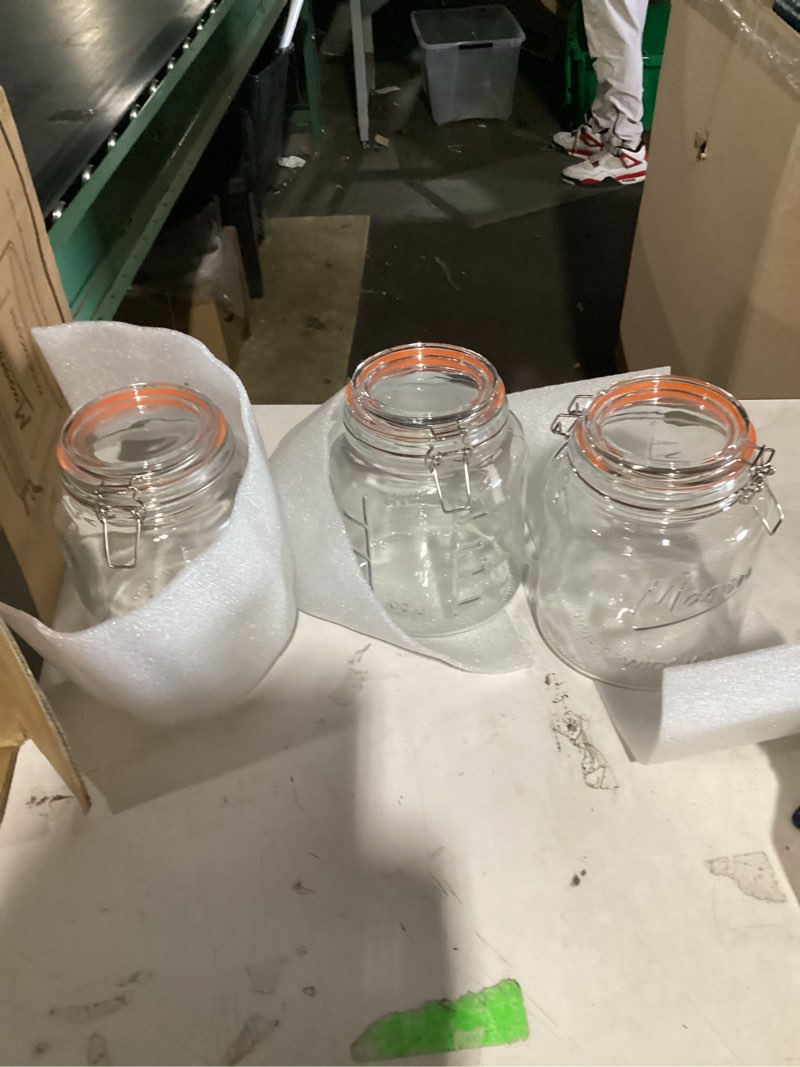 Condition photo showing As Is for 1 of 4 broken and missing kitchentoolz large glass mason jars with airtight lids - half gallon food storage & canning jars with measurement markings - kitchen pantry containers for flour, sugar & dry goods - 64 oz (4pk) pack of 4