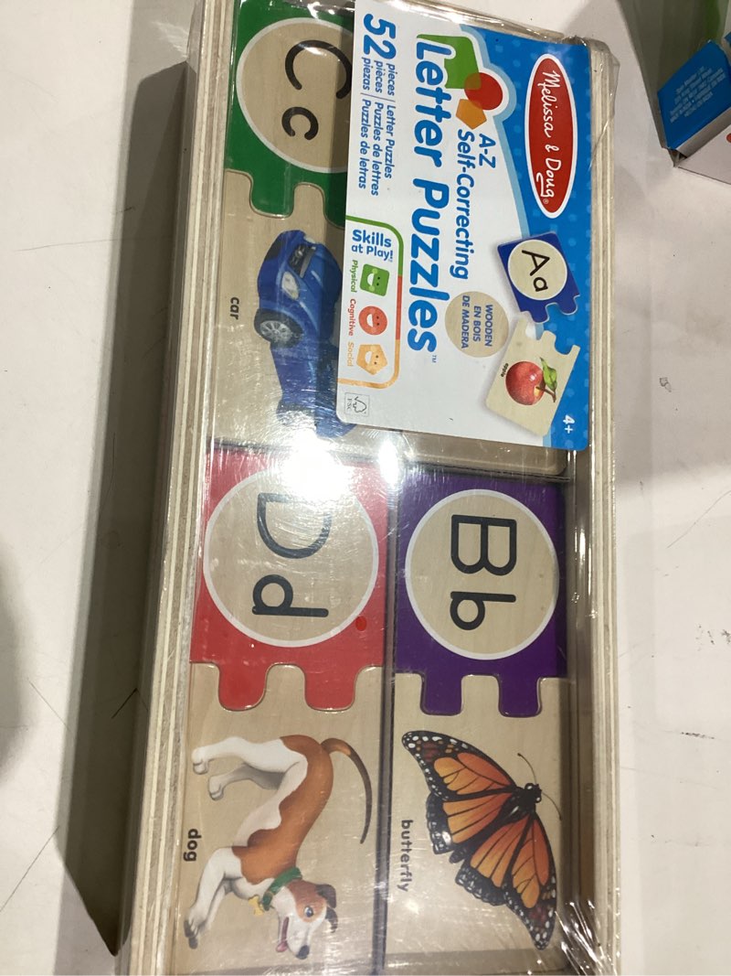 Condition photo showing New/Like New for Melissa & Doug Self-Correcting Alphabet Puzzle (52 pcs) with Toy Storage Box, Wooden ABC Puzzles for Toddlers & Preschoolers, Montessori Learning Toys for Girls & Boys 4+