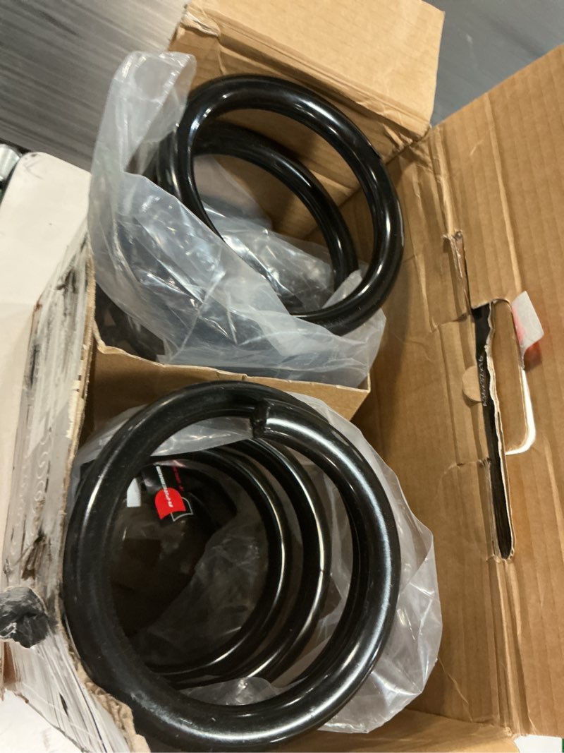 Condition photo showing As Is for moog 81069 coil spring set for chevrolet tahoe