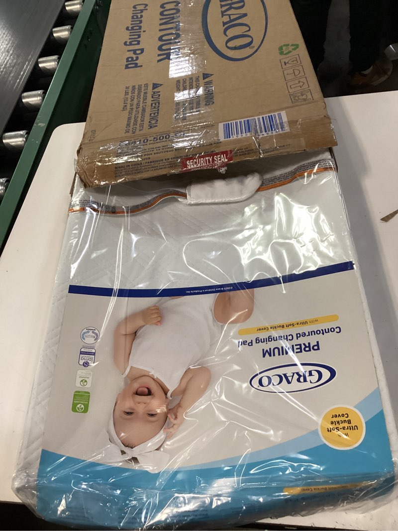 Condition photo showing New/Like New for Graco Premium Contoured Changing Pad – GREENGUARD Gold Certified, Water-Resistant, Ultra-Soft Buckle Cover, Contoured Baby Changing Pad, Fits Most Standard-Size Changing Toppers, Non-Skid Bottom