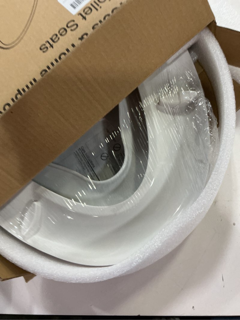 Condition photo showing New/Like New for potty training seat built-in toilet seat, elongated toilet seat 16.5inch with baby seat 2 in 1 soft close quiet no slapping, magnetic absorption, easy installation for bottom fixing toilet