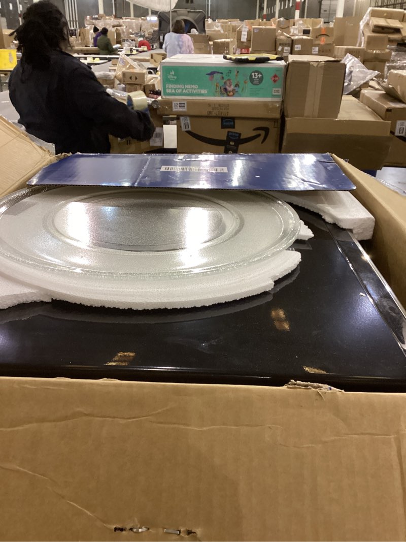 Condition photo showing As Is for GE Countertop Microwave Oven,1, 200-watt Capacity, 2.0 Cubic Ft., 8 Auto Setting Cooking Settings, C