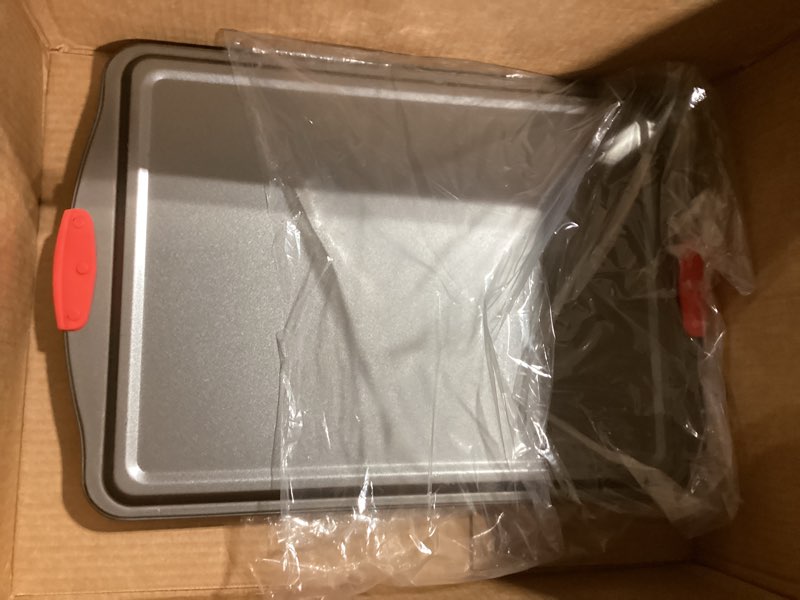 Condition photo showing Good Condition for NutriChef 3-Piece Nonstick Kitchen Oven Baking Pans - Premium & Stylish Non-Stick Steel, Commercial Grade Restaurant Quality Metal Bakeware with Red Silicone Handles - Easy to Clean, NCSBS3S 3-Piece Set