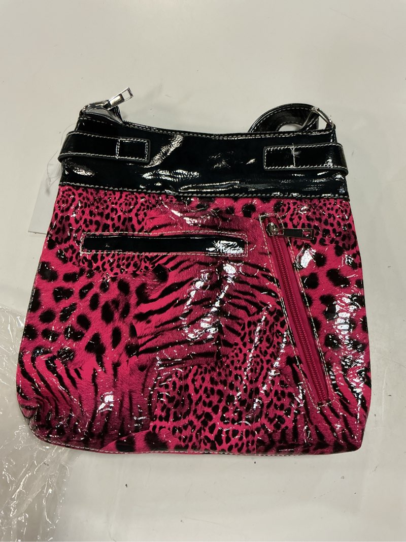 Condition photo showing Good Condition for pink studded concealed carry rhinestone skull crossbones accent handbag