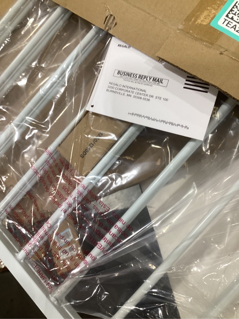 Condition photo showing item condition for Regalo 2-in-1 Extra Wide Stairway and Hallway Walk ThroughBaby Safety Gate, Hardware Mounting, White 24"x40.5"x28.5"(Pack of 1) White 24-40.5"W x 28.75"H